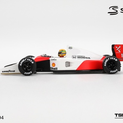 Miniatura de carro de Fórmula 1 branca e vermelha com logótipos Goodyear, Shell e Honda