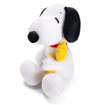 Pelúcia Snoopy branco e preto segurando uma pelúcia amarela Woodstock.