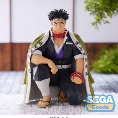 Figura colecionável de personagem masculino de joelhos com capa e acessórios vermelhos