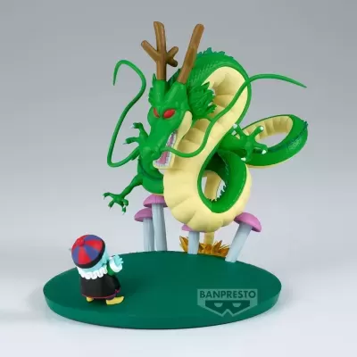 Figura decorativa de dragão verde e personagem em base verde com cogumelos