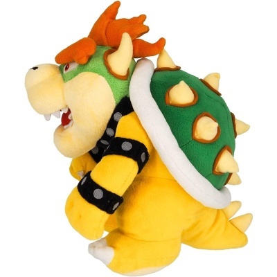 Pelúcia do personagem Bowser com casco verde e espinhos amarelos