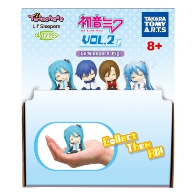 Caixa azul claro com figuras chibi de personagens Hatsune Miku e texto promocional
