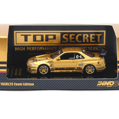 Miniatura de carro desportivo dourado embalado