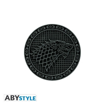 Moeda preta com emblema da casa Stark em relevo sobre fundo branco