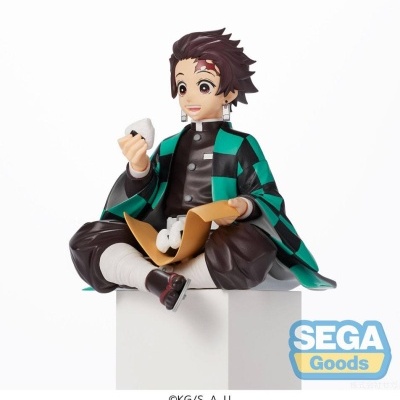 Figura colecionável de personagem anime com casaco verde e preto sentado e segurando comida
