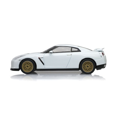 Miniatura de carro desportivo branco com jantes douradas