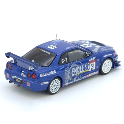 Miniatura de carro de corrida azul com rodas brancas e decoração ENDLESS, com spoiler e antena