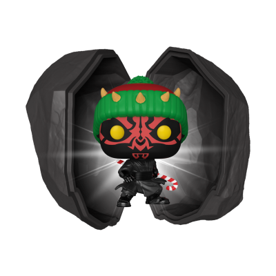 Figura Funko Pop máscara preta e vermelha com olhos amarelos e fita verde com chifres, dentro de casca de pedra aberta