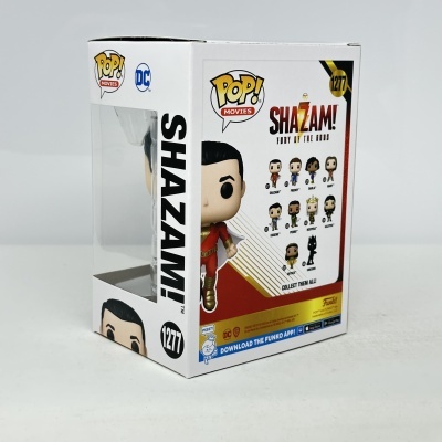 Figura Funko Pop! Shazam! numa caixa com design branco e vermelho e várias figuras da coleção no verso