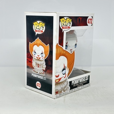 Funko Pop Pennywise número 472 na caixa com ilustrações e vinil visível