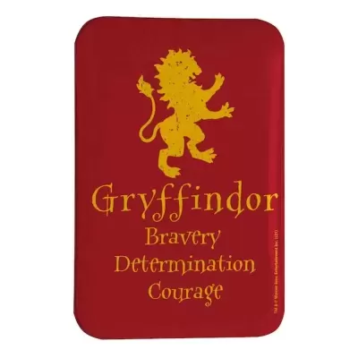 Manta vermelha com estampa dourada de leão e texto Gryffindor