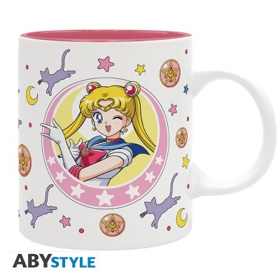 Caneca branca com interior rosa e ilustração de Sailor Moon e símbolos cósmicos.