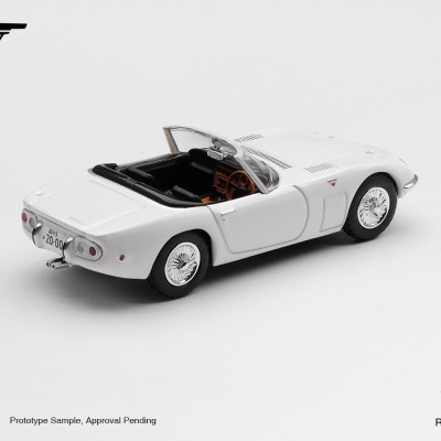 Modelo de carro de colecionador branco com volante castanho e assentos pretos