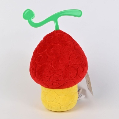 Brinquedo macio em formato de cogumelo vermelho amarelo e verde