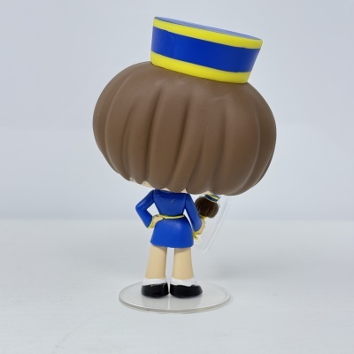 Figura Pop vinyl com cabelo castanho e roupa azul vista de costas