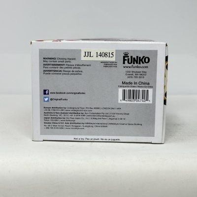 Parte traseira da embalagem de Funko com avisos de segurança e informações de fabricação