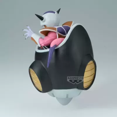 Figura colecionável de personagem numa cápsula preta com detalhes dourados