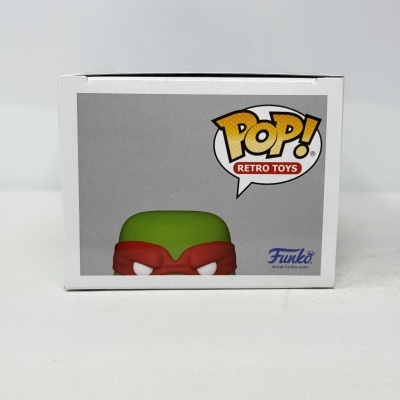 Embalagem Funko Pop! Retro Toys com figura verde e máscara vermelha