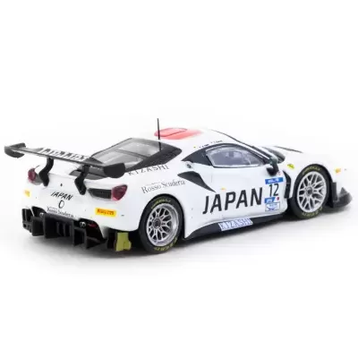 Modelo de carro de corrida branco com detalhes pretos, inscrições JAPAN e número 12