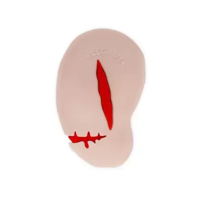 Peça em silicone rosa com detalhes vermelhos e palavra LEGAMI em relevo