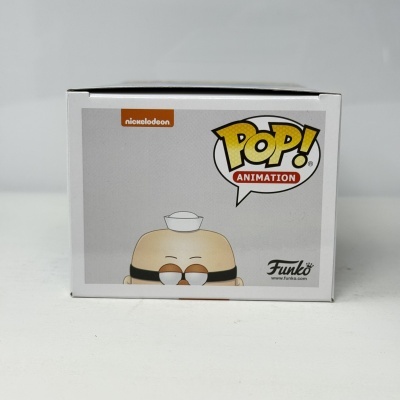Caixa branca com imagem de personagem Funko Pop Animation e texto promocional.
