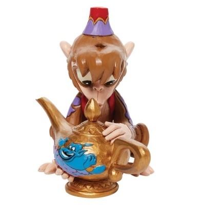 Figura decorativa de macaco com jarro dourado e génio azul