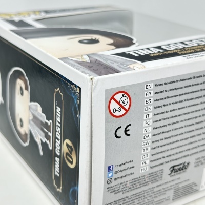 Caixa de vinyl figure Funko Pop Tina Goldstein número 04 com advertência e símbolos de redes sociais