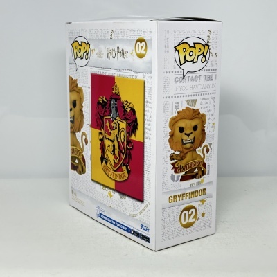 Caixa branca Funko Pop Gryffindor Harry Potter com leão e brasão amarelo vermelho.