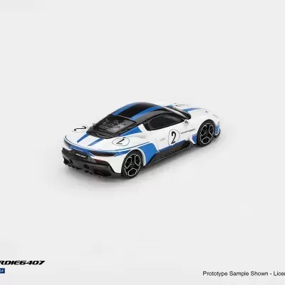 Miniatura de carro desportivo branco e azul com número 2