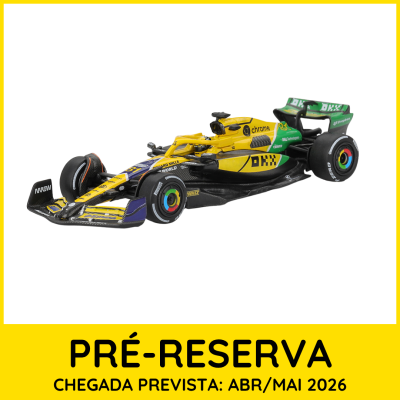 Miniatura de carro de Fórmula 1 amarelo, verde e preto com logótipos, em fundo branco e moldura amarela