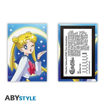 Capinha/cartão com desenho da personagem Sailor Moon em fundo azul estrelado
