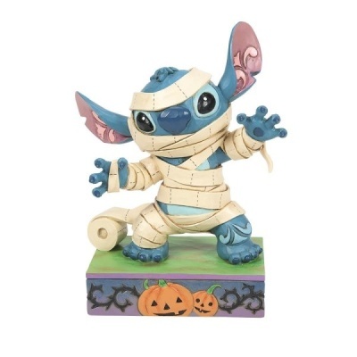 Figura Stitch vestido de múmia com base decorada com abóboras