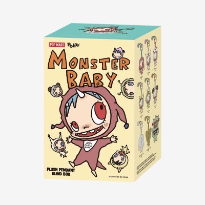 Caixa de brinquedo Monster Baby com ilustração de bebé monstro em roupa castanha