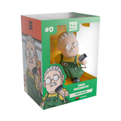 Embalagem de figura em vinil do personagem Taro Sakamoto com camiseta amarela e avental verde