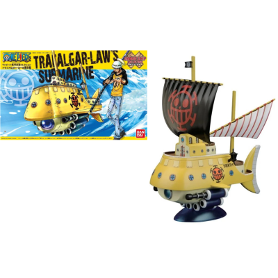 Modelo de submarino amarelo com vela preta e símbolo vermelho ao lado da caixa com texto TRAFALGAR-LAW'S SUBMARINE.