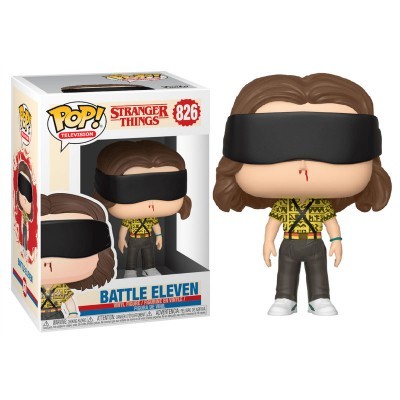Figura Funko Pop! Battle Eleven de Stranger Things com olhos vendados e roupa amarela e preta ao lado da caixa.