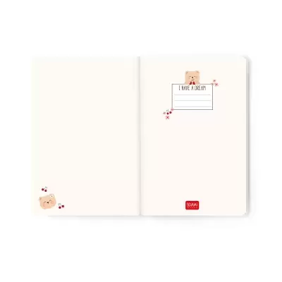 Interior de caderno branco com ilustrações de urso e texto I HAVE A DREAM