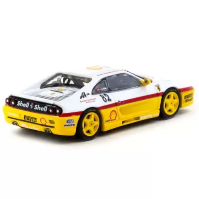 Miniatura de carro de corrida branco e amarelo com logótipos Shell e Pirelli e rodas amarelas