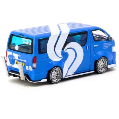 Miniatura de carrinha azul com gráficos brancos e pneus Toyo Tires