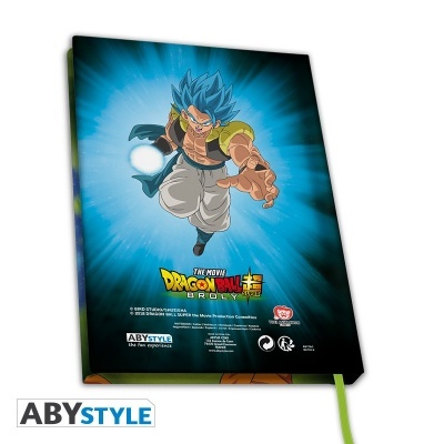 Caderno com capa ilustrada Dragon Ball Super em pose de ataque, fundo azul e preto, com texto e logos na parte inferior