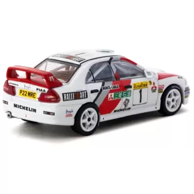 Modelo de carro de corrida branco com detalhes vermelhos, placa P22 MRE e logos RALLI ART, MICHELIN, MONTE-CARLO.