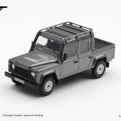 Miniatura de Land Rover cinzento metalizado com quatro portas e tejadilho em grade preta