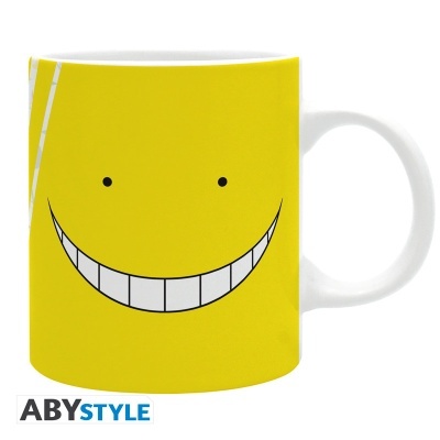 Caneca branca com rosto sorridente amarelo e detalhes em preto