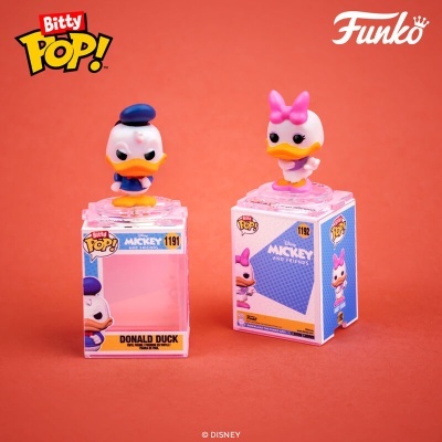 Figura Funko Pop Bitty Donald Duck e Daisy Duck sobre caixas