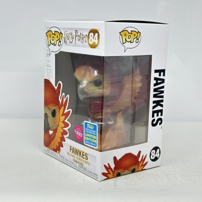 Funko Pop! Fawkes Harry Potter nº 84 em caixa branca com janela transparente.