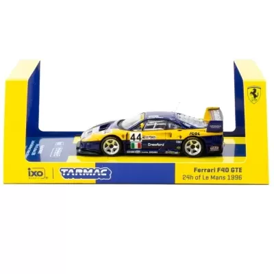 Miniatura de Ferrari F40 GTE azul e amarela nas 24h de Le Mans 1996 numa base azul e amarela