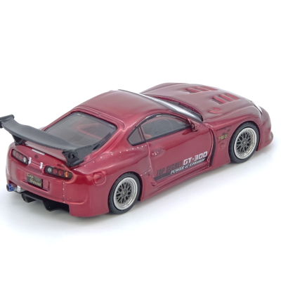 Miniatura carro desportivo vermelho com spoiler preto e texto TOP SECRET GT-300