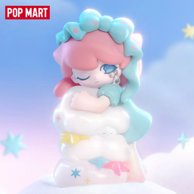 Figura de vinil colorida com cabelo rosa e azul claro segurando nuvem branca