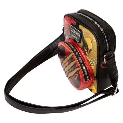 Mala pequena de ombro preto com bolso frontal vermelho e amarelo com decoração de banda desenhada