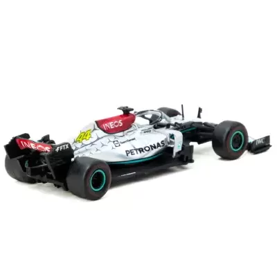 Modelo de carro de Fórmula 1 branco e preto com detalhes vermelhos